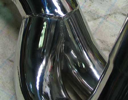Over axle pipe y junction
